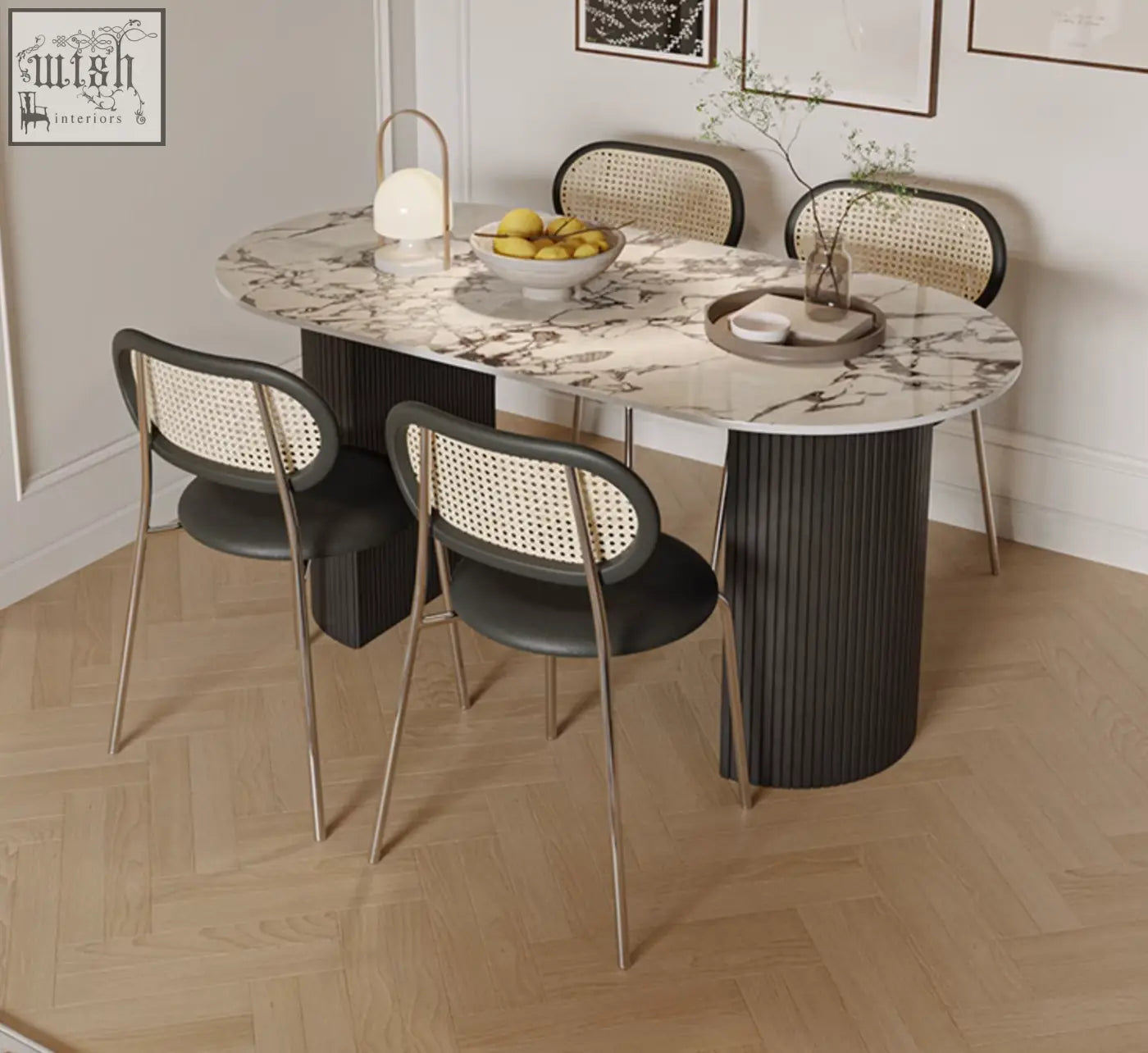 Esther oval dining table with marble top and black ribbed cylindrical legs featuring a modern minimalist design