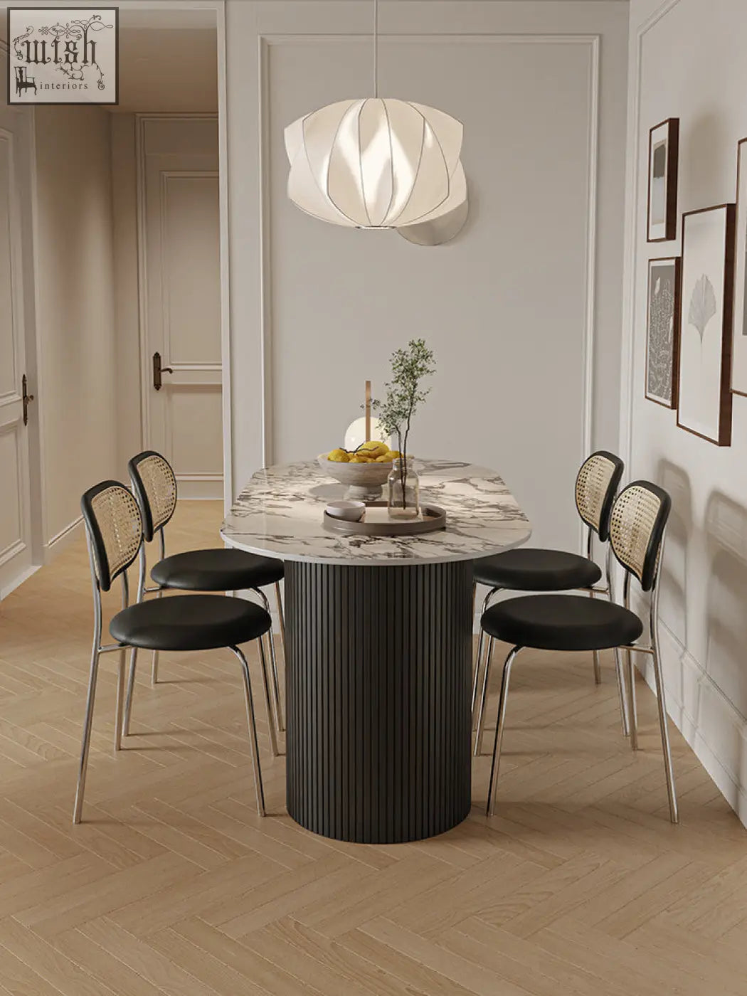 Esther oval dining table with a marble top and dark gray fluted pedestal base perfect modern dining table