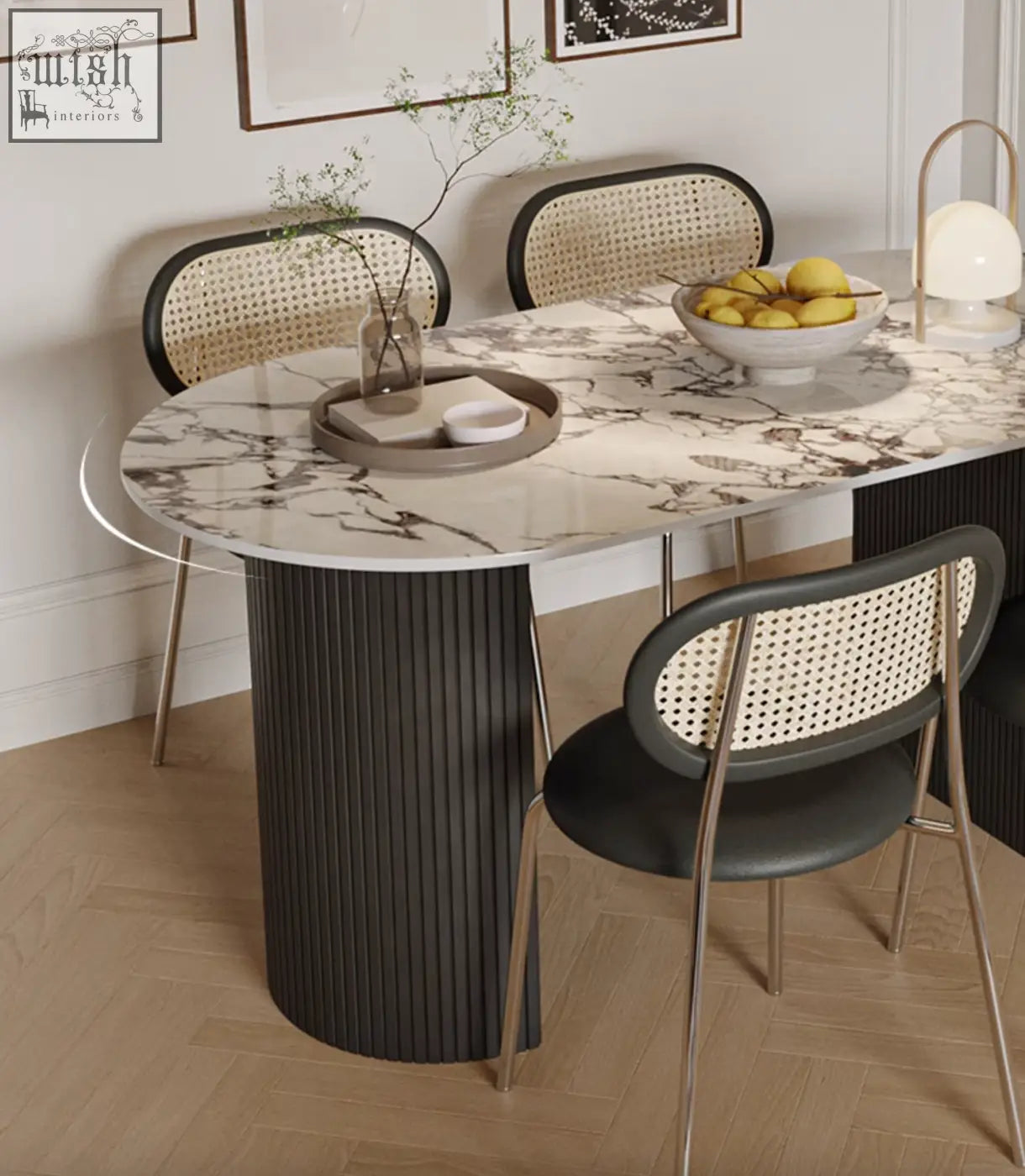 Esther oval dining table with white marble top featuring gray veining and dark gray ribbed legs perfect as a dining table