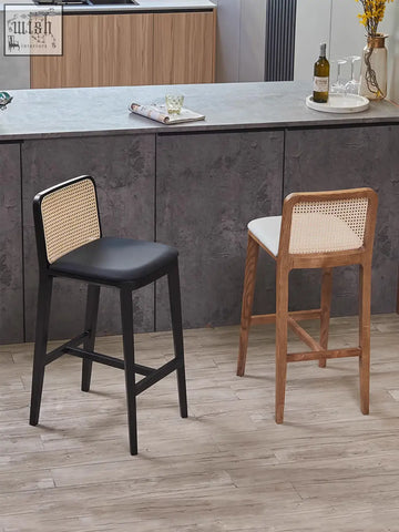 Back view of ethan rattan barstool with black leather seat and woven cane wood frame perfect for coffee table set