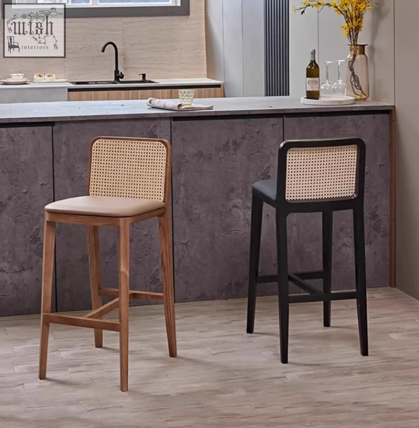 Two ethan rattan barstools with woven cane backs in natural wood and black wood frames perfect for table sets