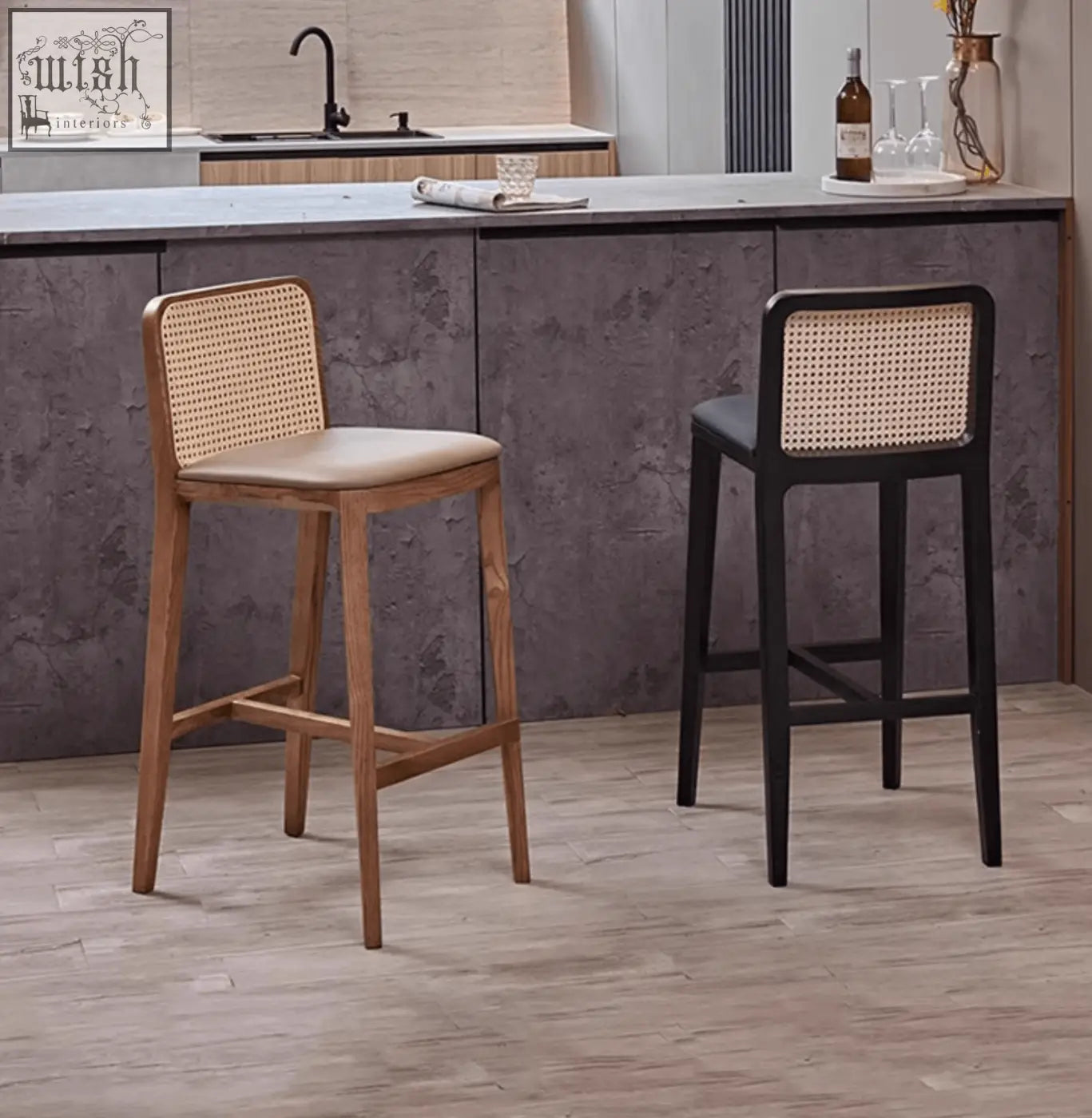 Two ethan rattan barstools with woven cane backs and wooden frames in natural and black perfect for coffee table set seating