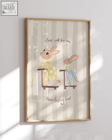 A framed big sister rabbit art print showing a rabbit pair in pajamas riding shopping carts with everlasting love text