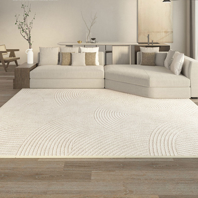 Cream-colored evitany living room rug with subtle textured wave pattern woven into the surface for cozy living room use