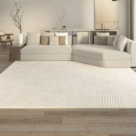 Cream-colored evitany living room rug with subtle textured wave pattern woven into the surface for cozy living room use
