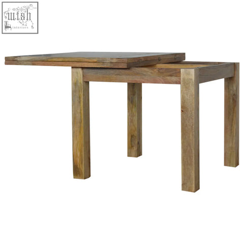 Rustic extendable dining table with oak finish and natural mango wood grain patterns perfect for family meals