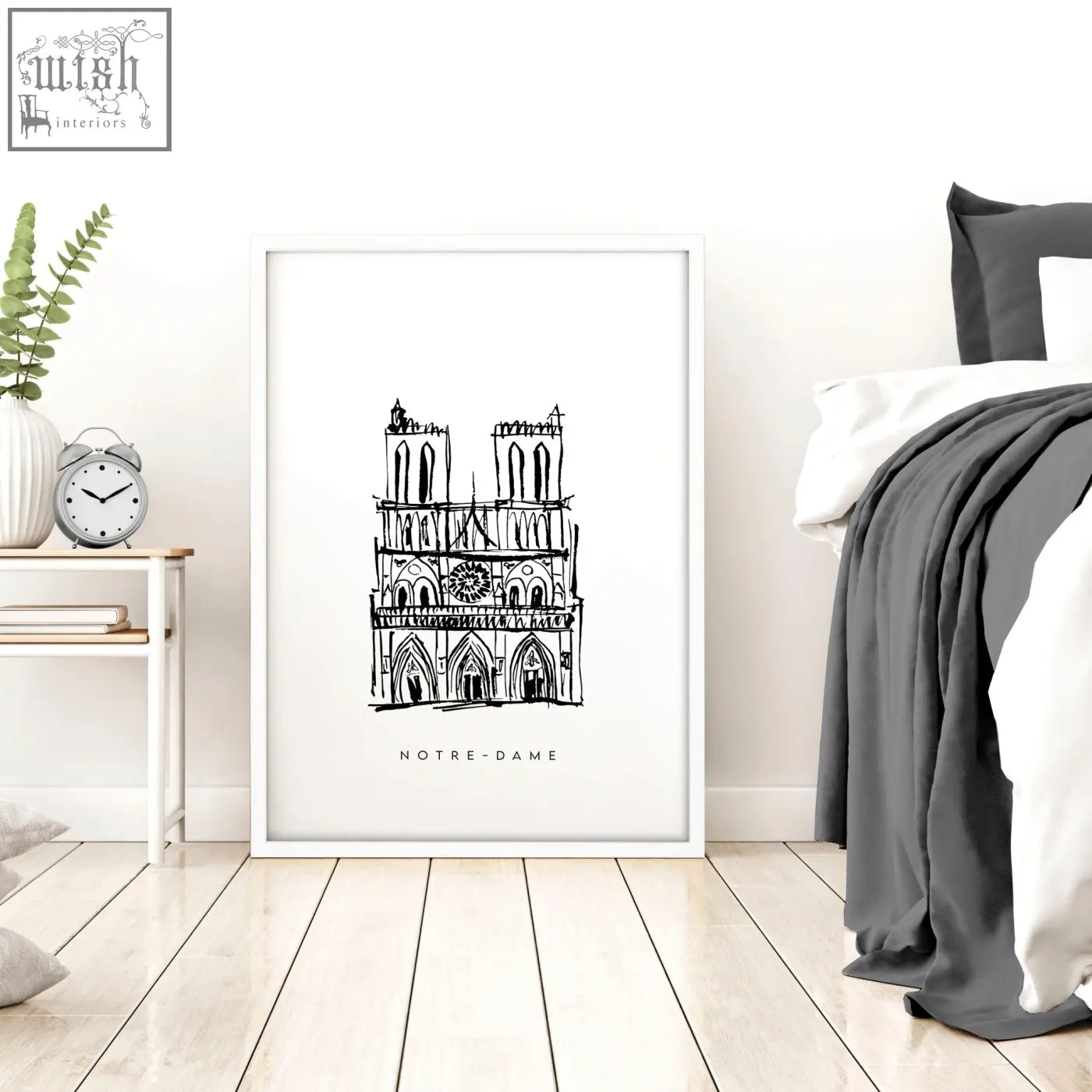 Minimalist black and white line art wall art of notre dame cathedral in a white frame featuring extra large wall style
