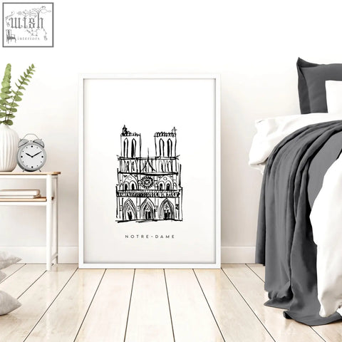 Minimalist black and white line art wall art of notre dame cathedral in a white frame featuring extra large wall style
