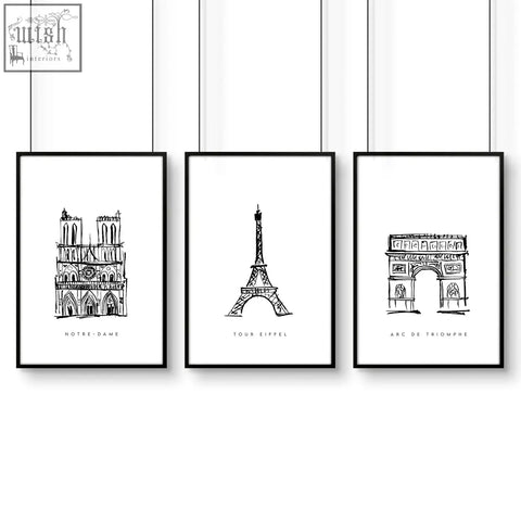 Set of three extra large black-framed wall art prints featuring minimalist paris landmarks line art designs