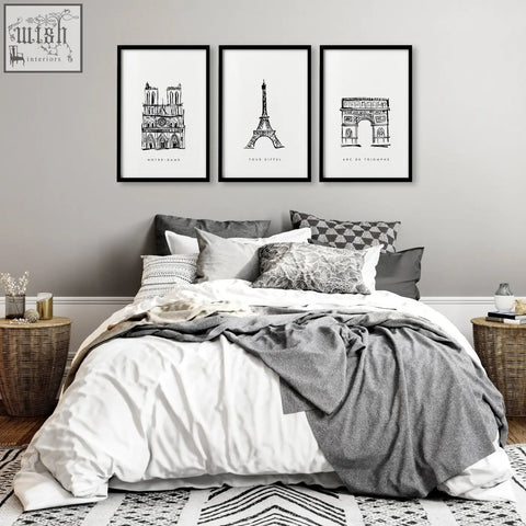 Three black-framed minimalist line art prints of notre-dame eiffel tower and arc de triomphe as extra large wall art set