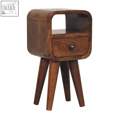 A sleek dark brown wooden extra mini chestnut curve bedside table with open slot and three tapered legs