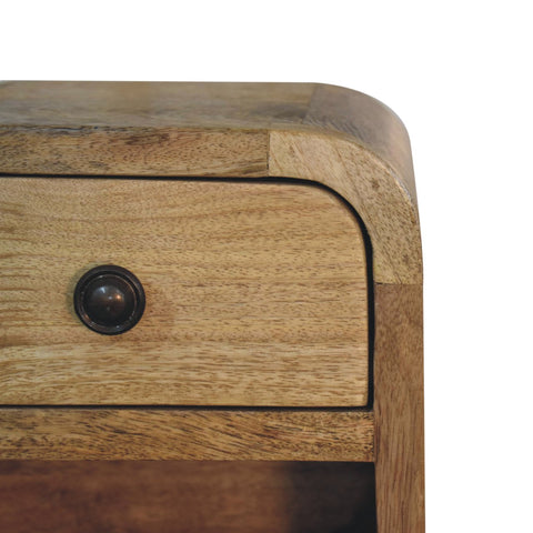 Light brown wooden extra mini curved oak-ish bedside table with open slot and dark metal drawer knob