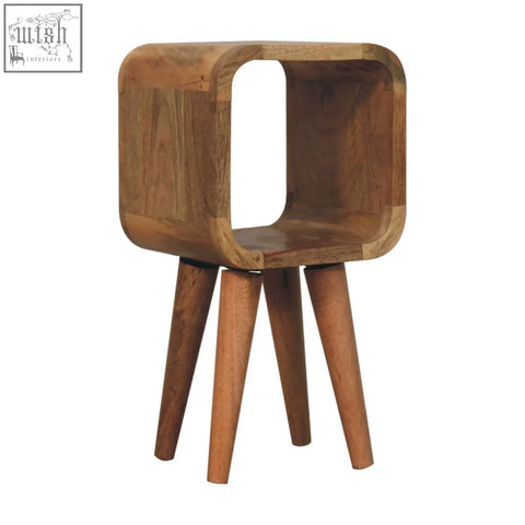 A rustic extra mini minimalist open shelf side table with open curved oak-ish wood and three tapered legs
