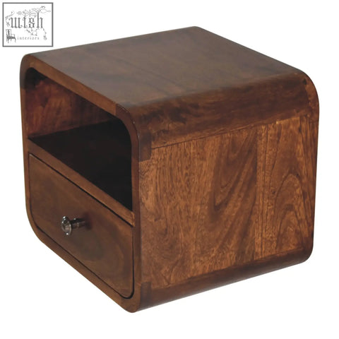 Dark brown curved nightstand with single drawer and silver knob made from solid mango wood for bedside use