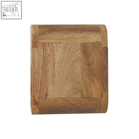 A square wooden coaster with natural light brown mango wood finish and visible grain near an extra mini wall mounted open slot bedside
