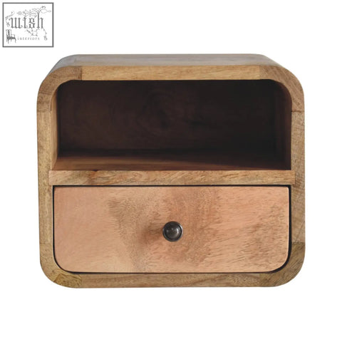 A rustic extra mini wall mounted bedside in mango wood with open slot a single drawer and dark metal knob