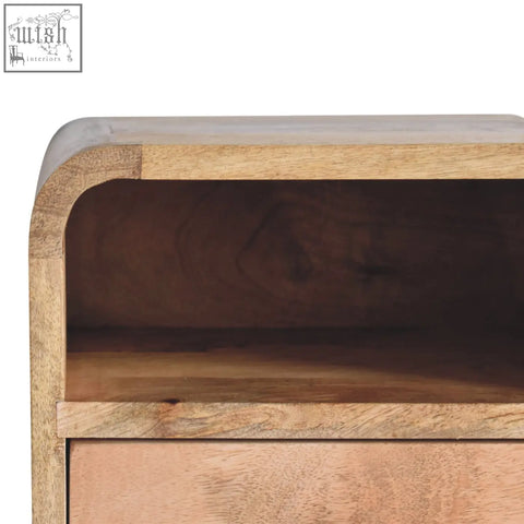 Extra mini wall mounted curved oak-ish bedside in light brown mango wood with visible wood grain and open slot design