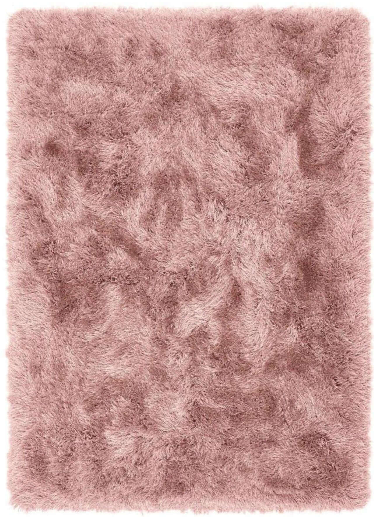 A plush extravagance rose shaggy rug with soft fluffy texture and subtle pink shade variations