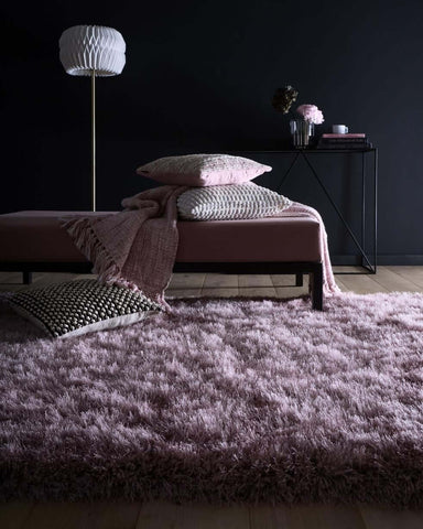A plush lavender extravagance rose shaggy rug with dense fluffy texture perfect for cozy home decor