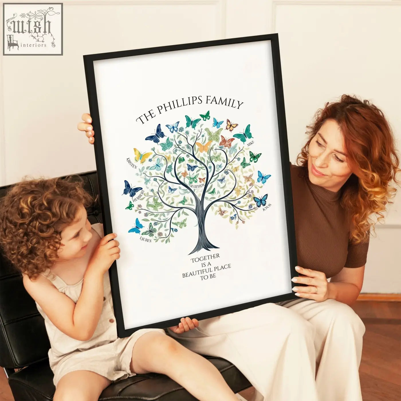 Black-framed family tree art print with colorful butterflies and green leaves titled the phillips family tree art wall decor