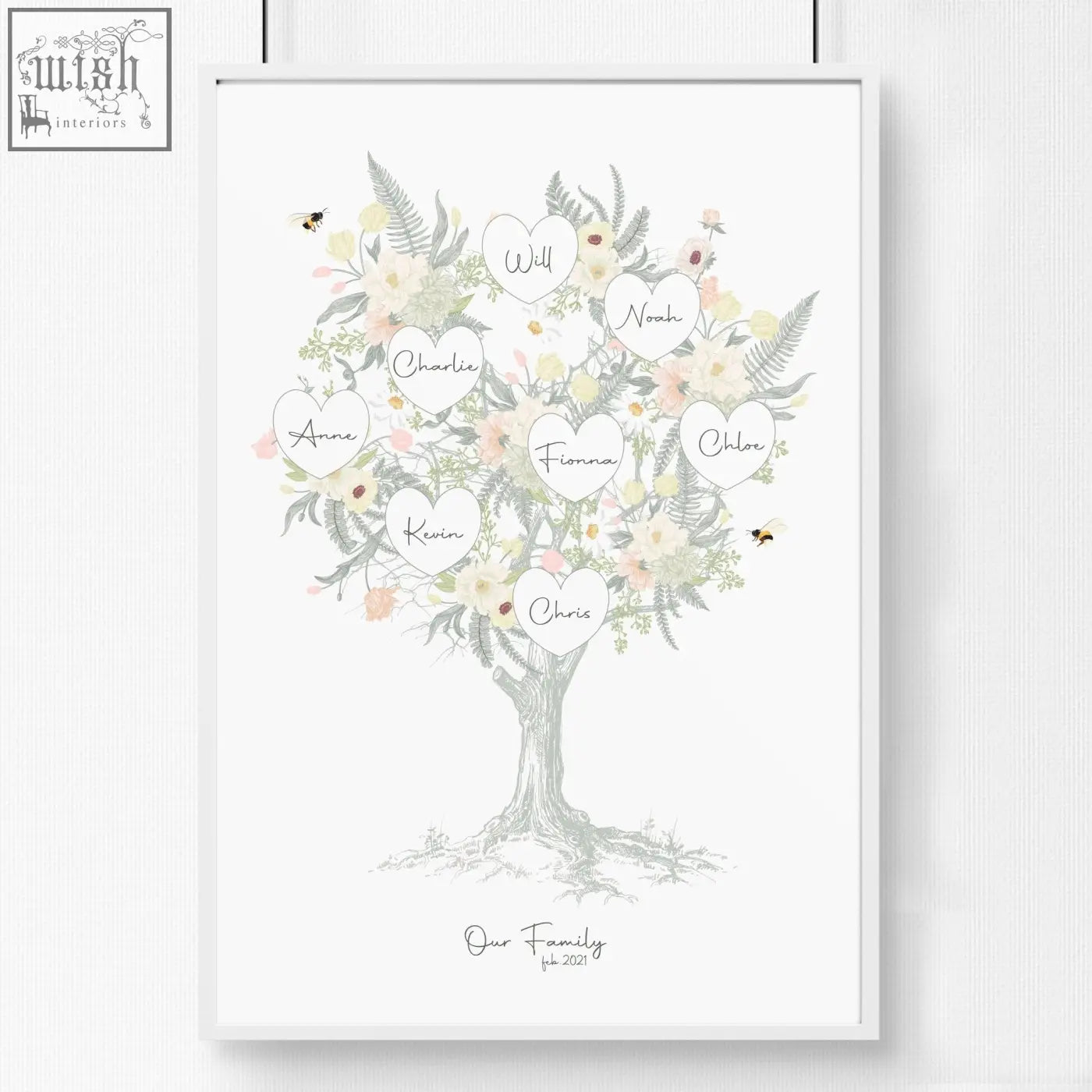 A framed family tree artwork print with delicate pastel blossoms and ferns featuring names in heart labels