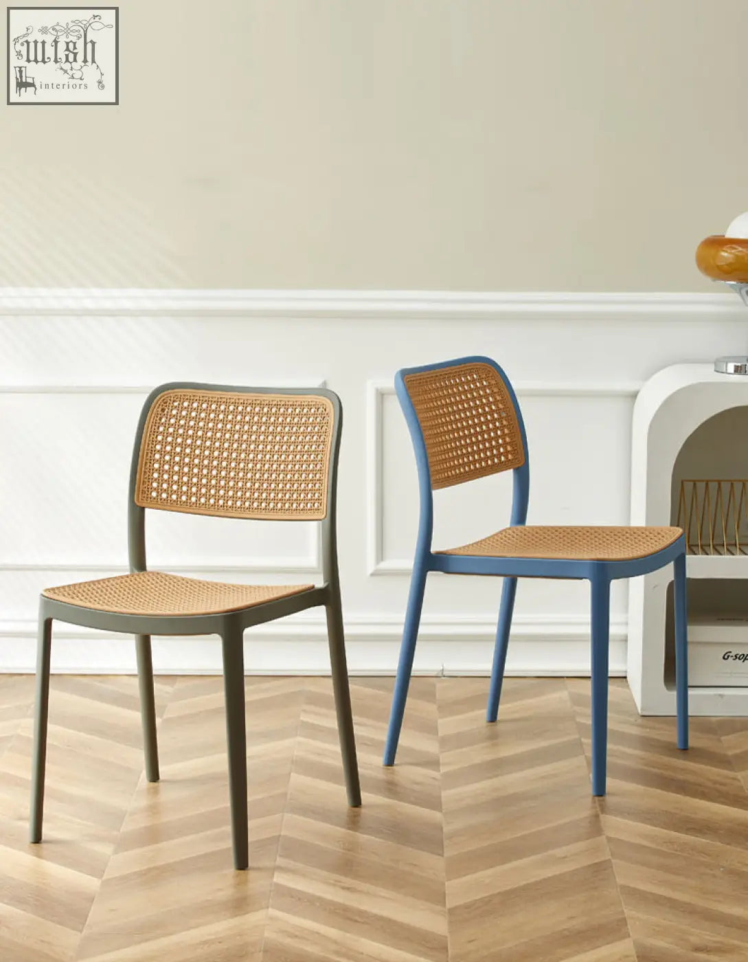 Two fanny dining chairs with woven cane seats and backs in matte gray and vibrant blue perfect for dining areas