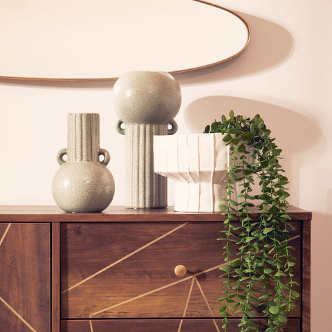 A fara white vase featuring a matte light gray ceramic finish with rounded body and vertical fluted columns