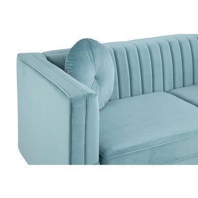 Farah three seater pastel green velvet sofa with vertical tufted back panels and matching round cushion in pastel green velvet