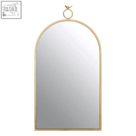 Gold-toned farran bird wall mirror features an arched frame with a delicate bird perched on the circular hanging ring