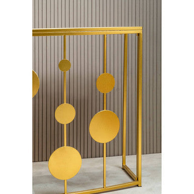 Golden metal geometric sculpture with circular discs on rods on farran champagne gold finish console table with mirror top