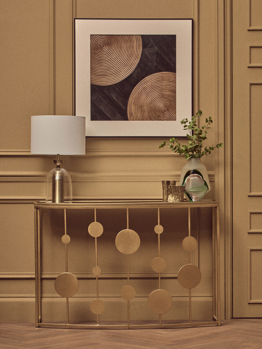 Farran champagne gold finish console table with mirror top featuring gold-toned metal and circular disc accents