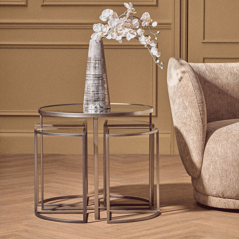 Farran set of 5 silver finish tables with silver-toned metal geometric frames and glass tops for stylish nesting use