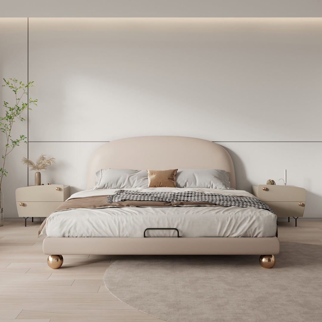 Beige upholstered fatima bed king size with curved headboard and gold-toned spherical feet for girl size bed
