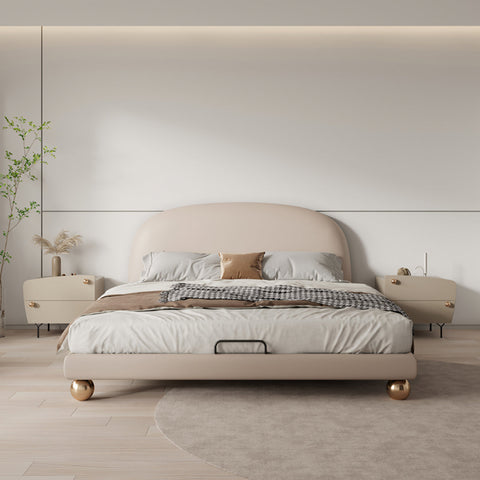 Beige upholstered fatima bed king size with curved headboard and gold-toned spherical feet for girl size bed