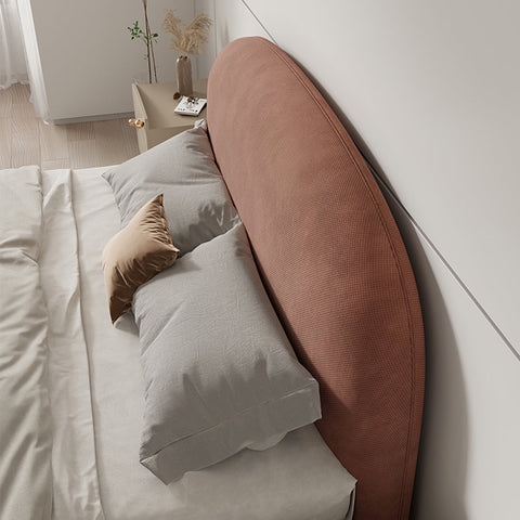 Soft curved rose gold fabric headboard of the fatima king size bed for girl with textured upholstery
