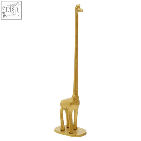 Gold-colored giraffe figurine toilet roll holder with sleek neck and detailed legs on oval base for toilet roll display