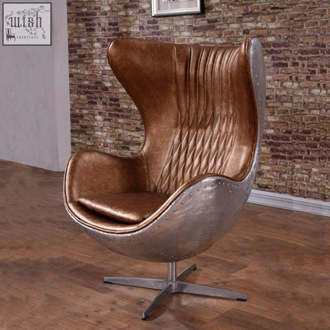 Bronze leather and silver metal fawkes aviator office chair with rivet detailing and aluminium shell design