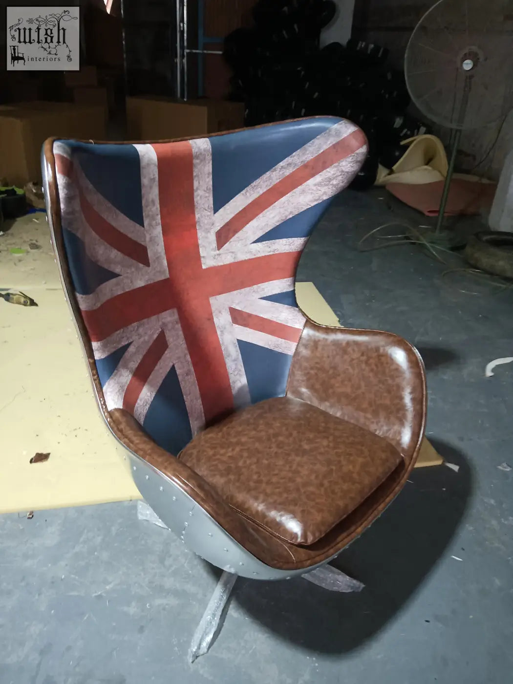 Retro-style fawkes aviator office chair with distressed union jack backrest and brown leather upholstery aluminum shell