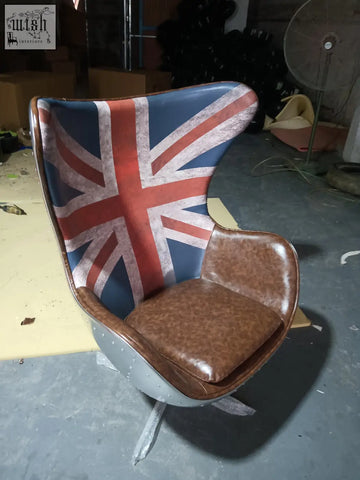 Retro-style fawkes aviator office chair with distressed union jack backrest and brown leather upholstery aluminum shell
