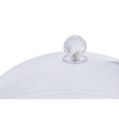 Clear faceted crystal knob on smooth white lid of faye clear acrylic cake stand with dome lid