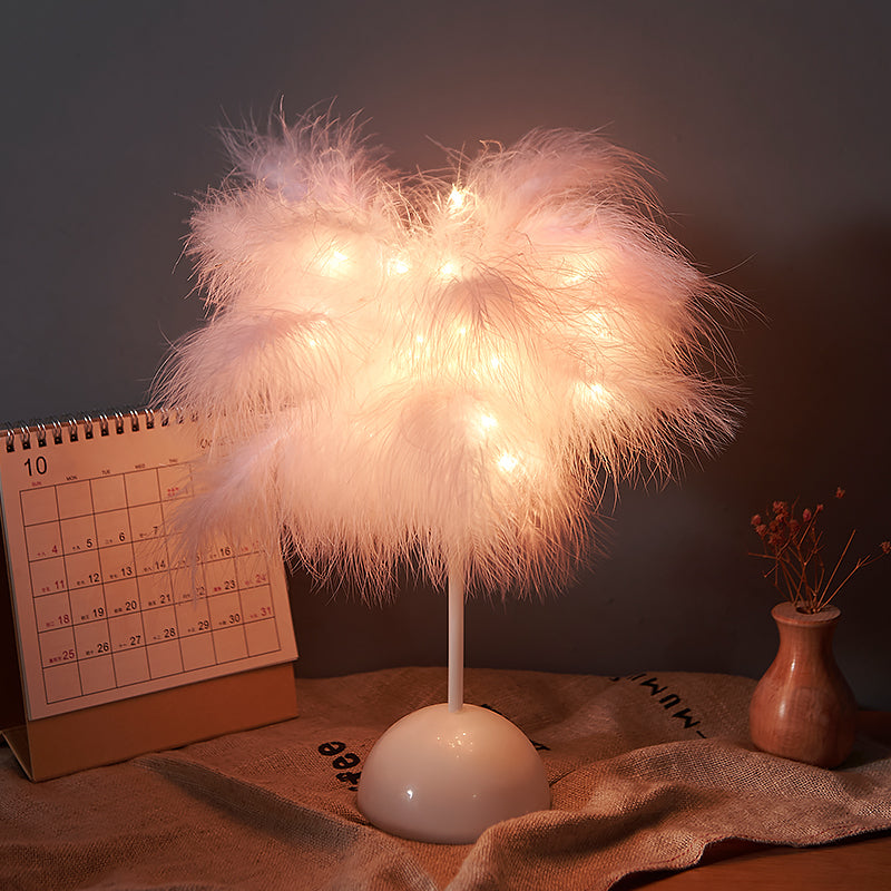 A soft white feather lamp with warm glowing lights and remote control powered for bedroom decoration
