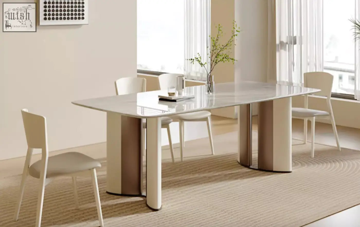 Felicia marble dining table with a sleek glossy white marble top and beige cylindrical legs for modern dining