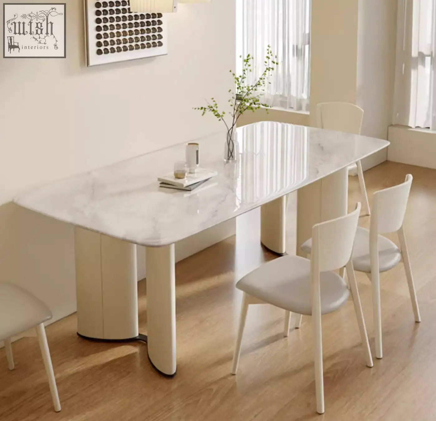 Modern felicia marble dining table with rectangular white marble top and cream cylindrical legs perfect for dining rooms
