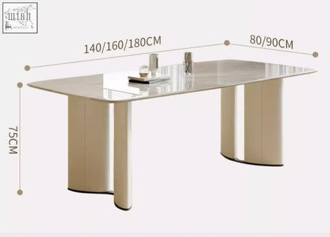 Modern felicia marble dining table with sleek reflective glass top and minimalist cream-colored cylindrical legs