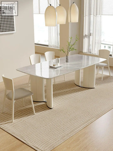 Modern white marble dining table felicia marble dining with sleek curved legs and minimalist design perfect for dining room