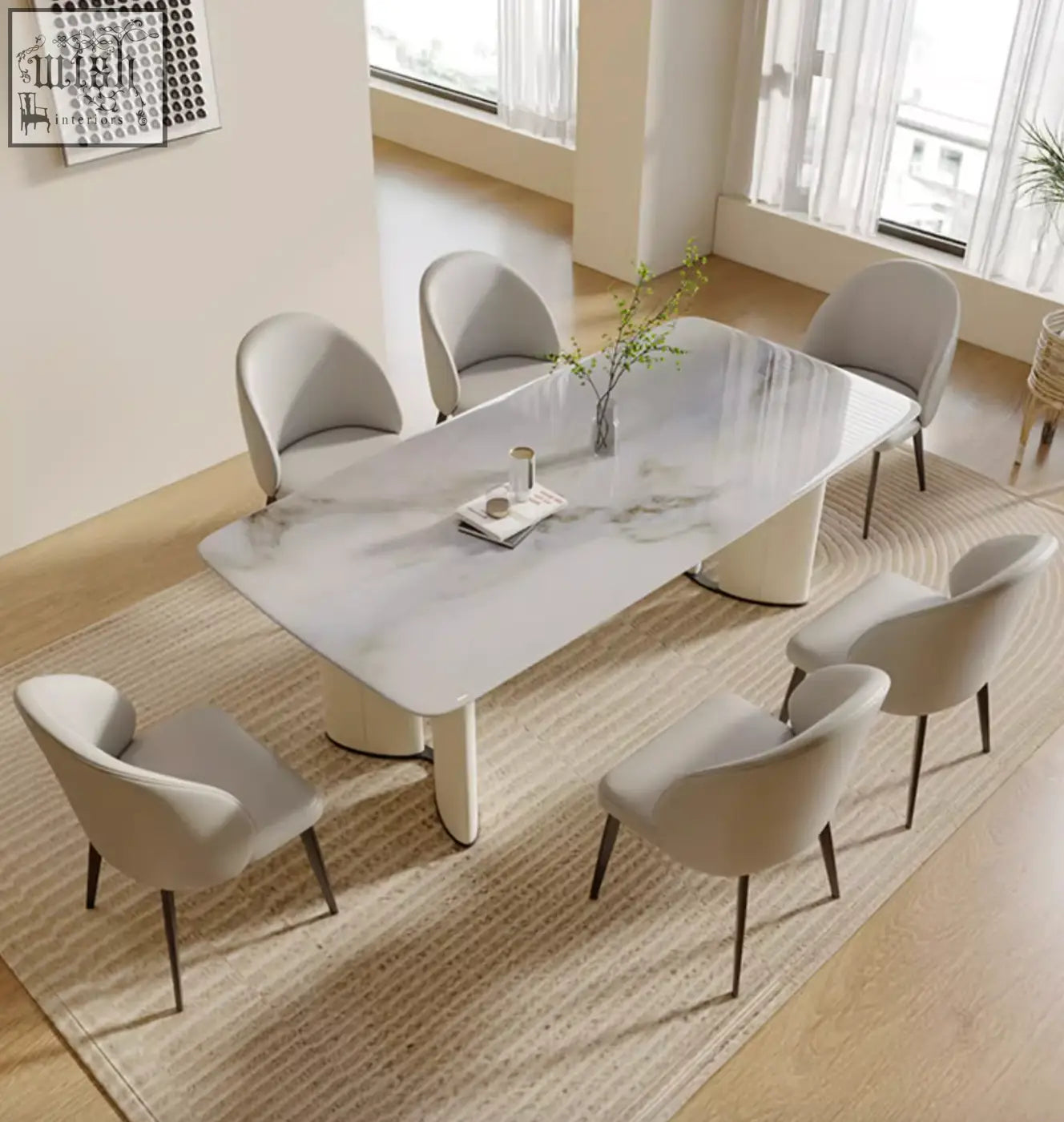Modern white marble dining table felicia marble dining with sleek curved legs and minimalist design