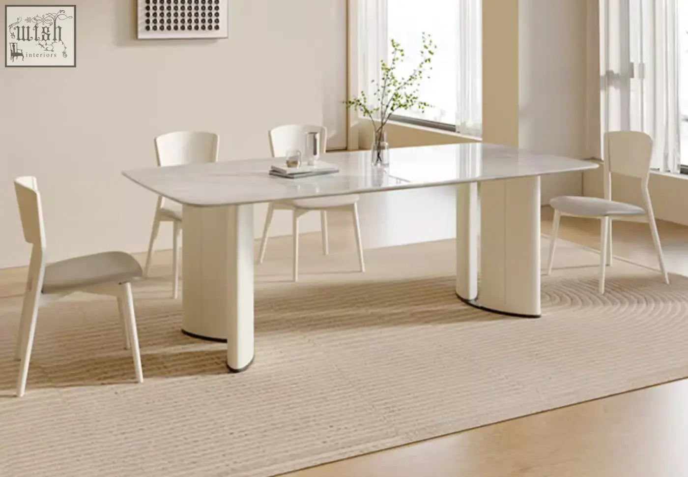 Modern white marble top felicia marble dining table with sleek cylindrical legs and minimalist design dining table