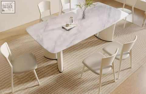 Felicia marble dining table with white marble top and sleek modern legs perfect for a stylish dining table setup