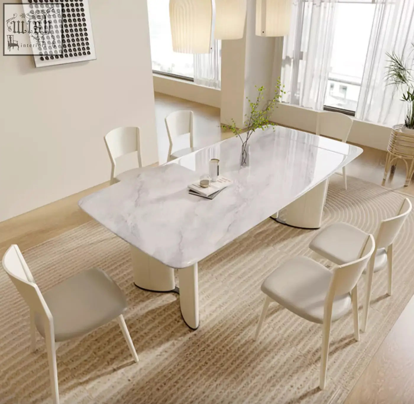 Felicia marble dining table with white marble top and sleek modern pedestal legs perfect as a dining table