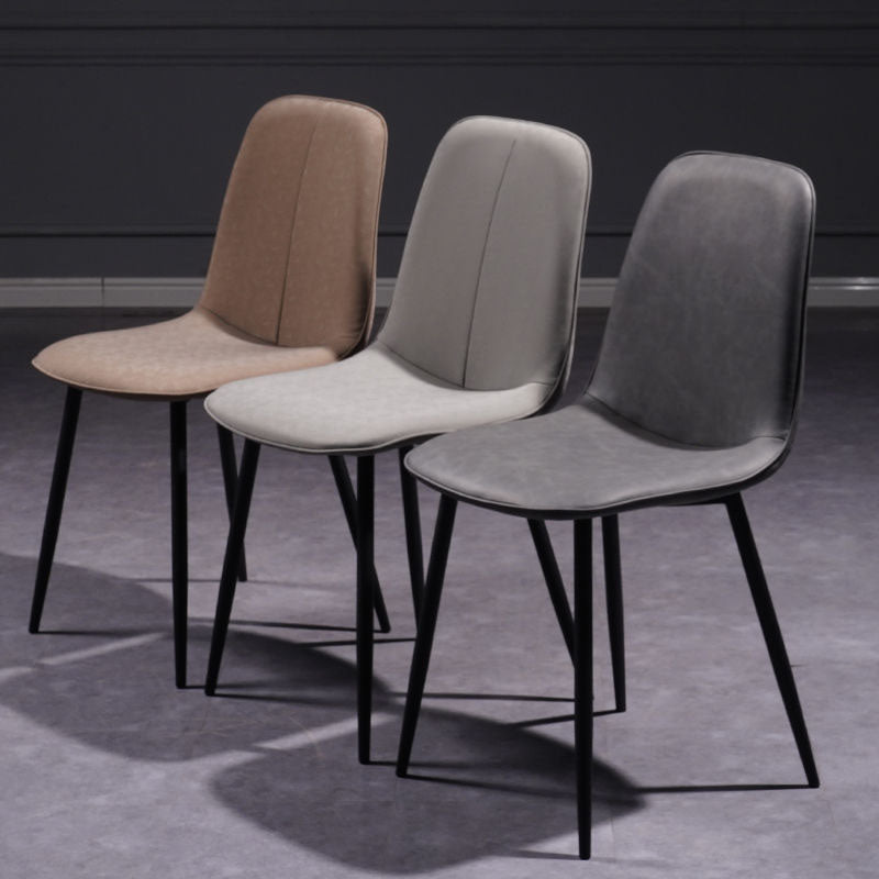 Felix II dining chair with upholstered beige, light gray, and dark gray seats and sleek black metal legs